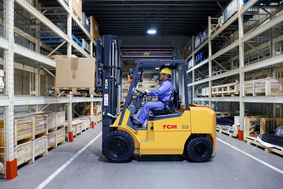 TCM T5 Series Counterbalance Forklift Truck in warehouse in action